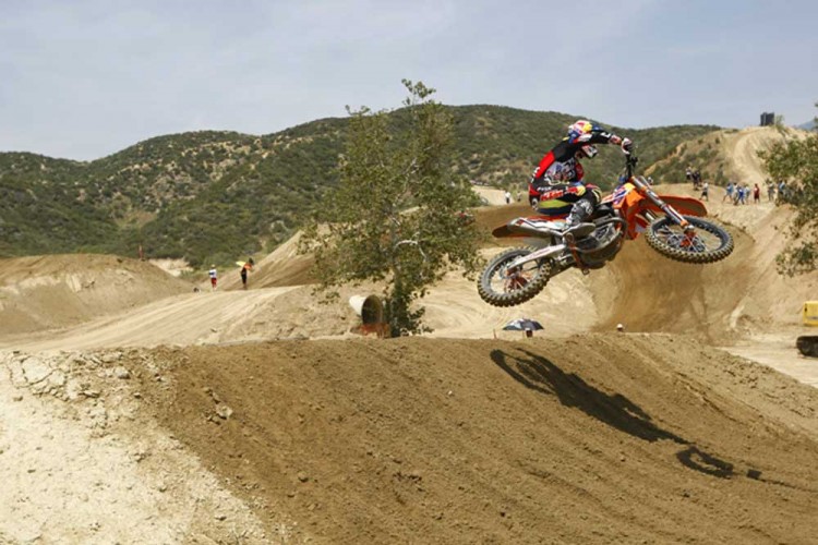 Ryan Dungey tries to stay low while boosting over the Wall Jump. 