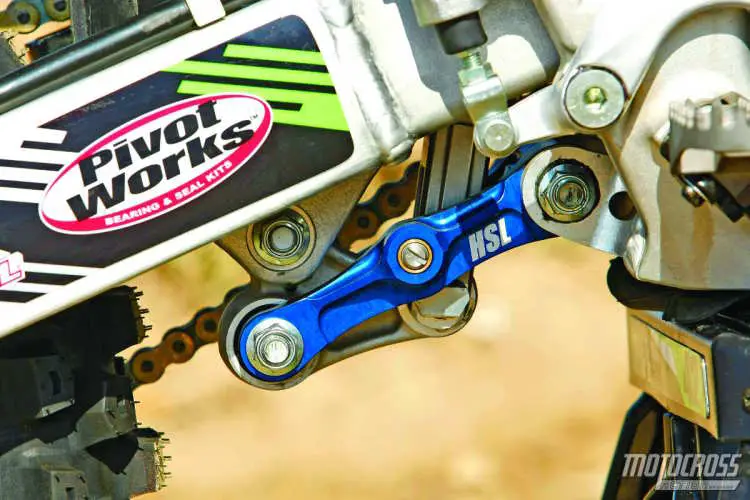 The $399 Holeshot Link locks the rear end down by 130mm for starting. It releases after hitting a bump. It was remarkably  efficient at keeping the rear end tracking straight. Better yet, MB1 is selling the HSL incorporated into a longer link arm than stock for better handling on the KX450F. 