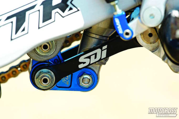 Suspension Direct (SDI) takes care of the rear shock  assembly. The longer pull rod and aftermarket bell crank change the rising rate and geometry. At 5-foot-4, Alex likes the rear of the YZ250F to stay down to prevent the rear end from kicking him in the rough. Martin runs taller JGR footpegs to decrease the size of the cockpit. Alex prefers low-profile Vortex handlebars with very little sweep. 