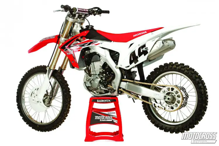 White paper: Honda’s corporate policy on motocross bikes is to make them easy-to-ride—which is code for slow. It’s not white-knuckle fast, more like pink-knuckle fast.