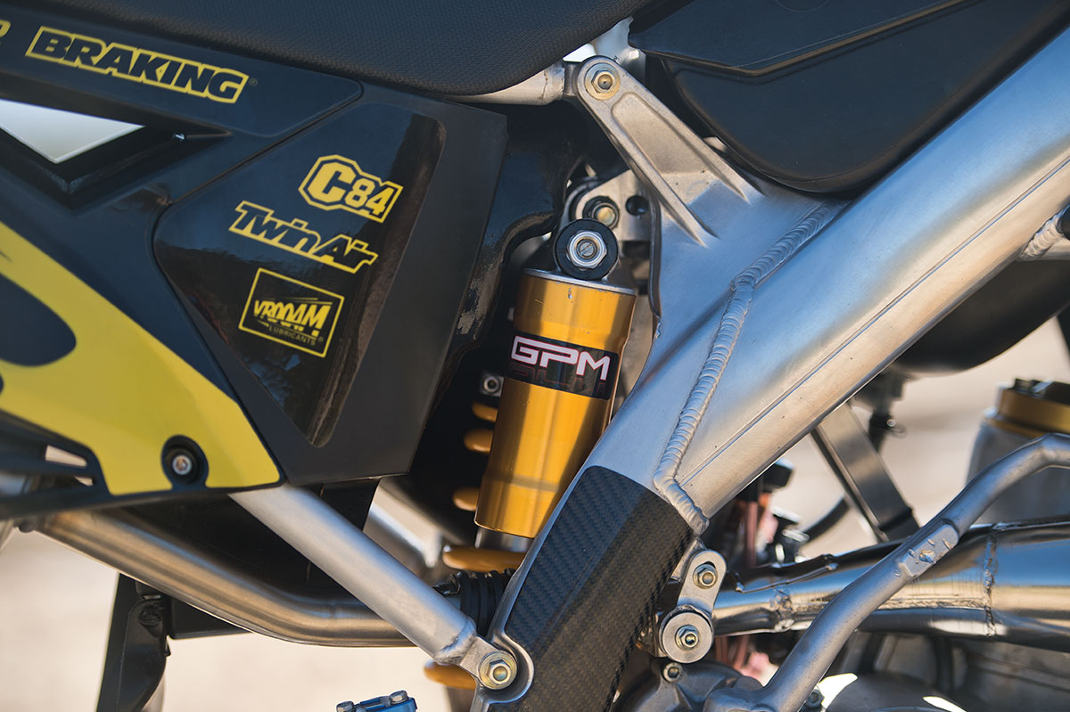 TM manufactures their own shock, but Ohlins has always been an option. Ralf sent it to Germany to be re-valved.