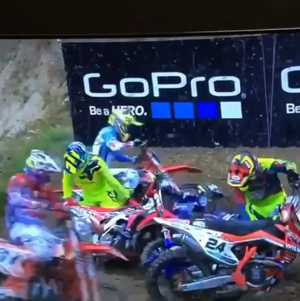 Romain Febvre gets hit by Tony Cairoli