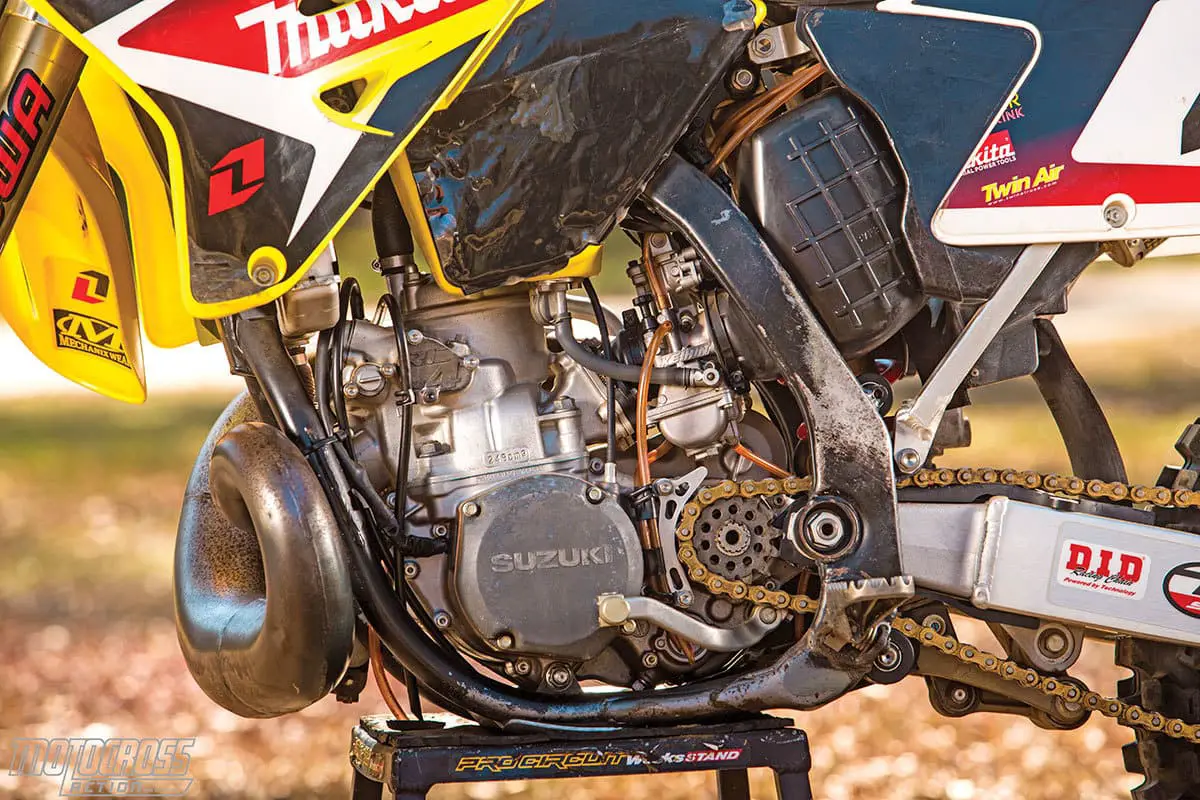 Carmichael’s 2005 Suzuki RM250 has been hidden in a storage garage 17 years. That doesn’t detract from the bike’s awesomeness. Take a close look at the works shifter with the custom aluminum shifter tip.