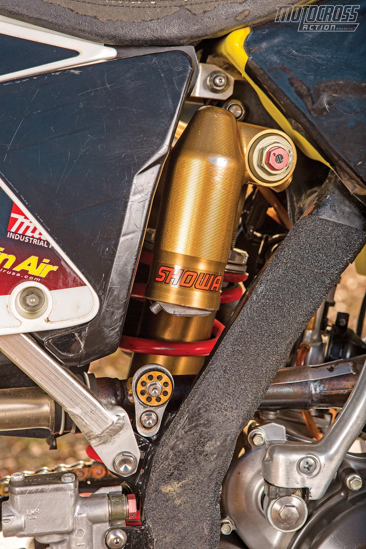 Ricky’s leathers wore a section of gold coating from the works Showa shock. It still shines.