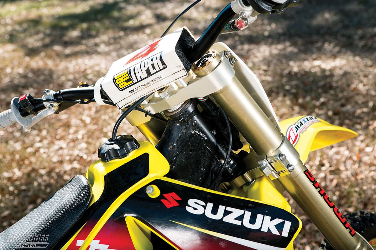 It was refreshing to spot a good old-fashioned standard-fare gas cap on Ricky Carmichael’s steed.